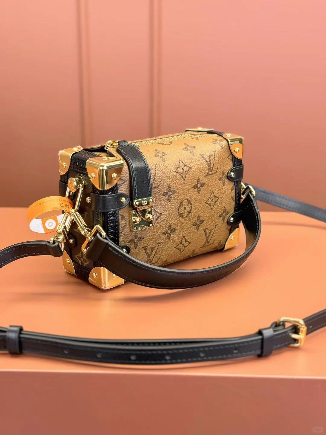 The LV Alma BB Monogram bag in a new Sakura Pink color.