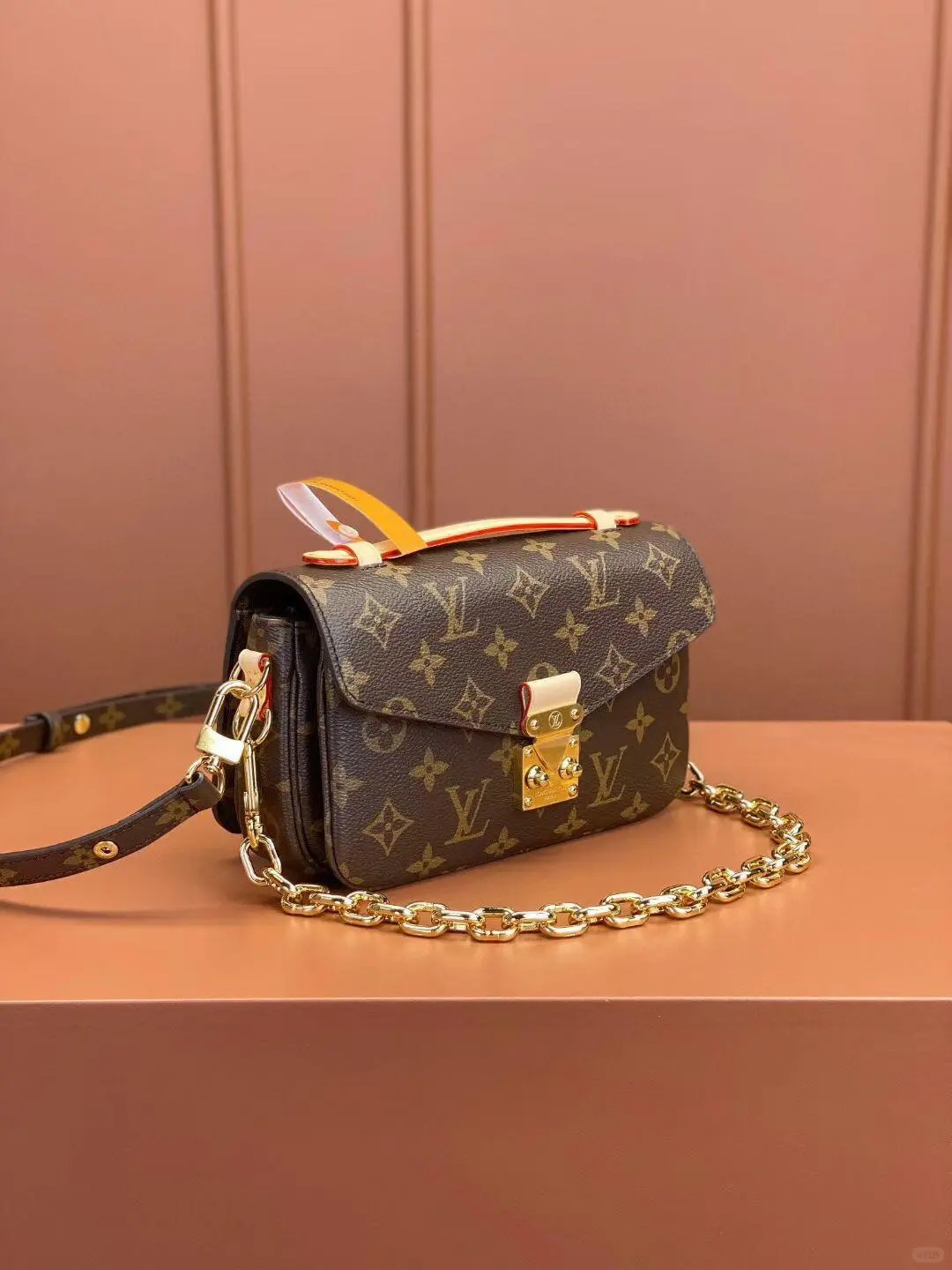 A collection of LV Neverfull Monogram bags, showcasing their spacious interiors.