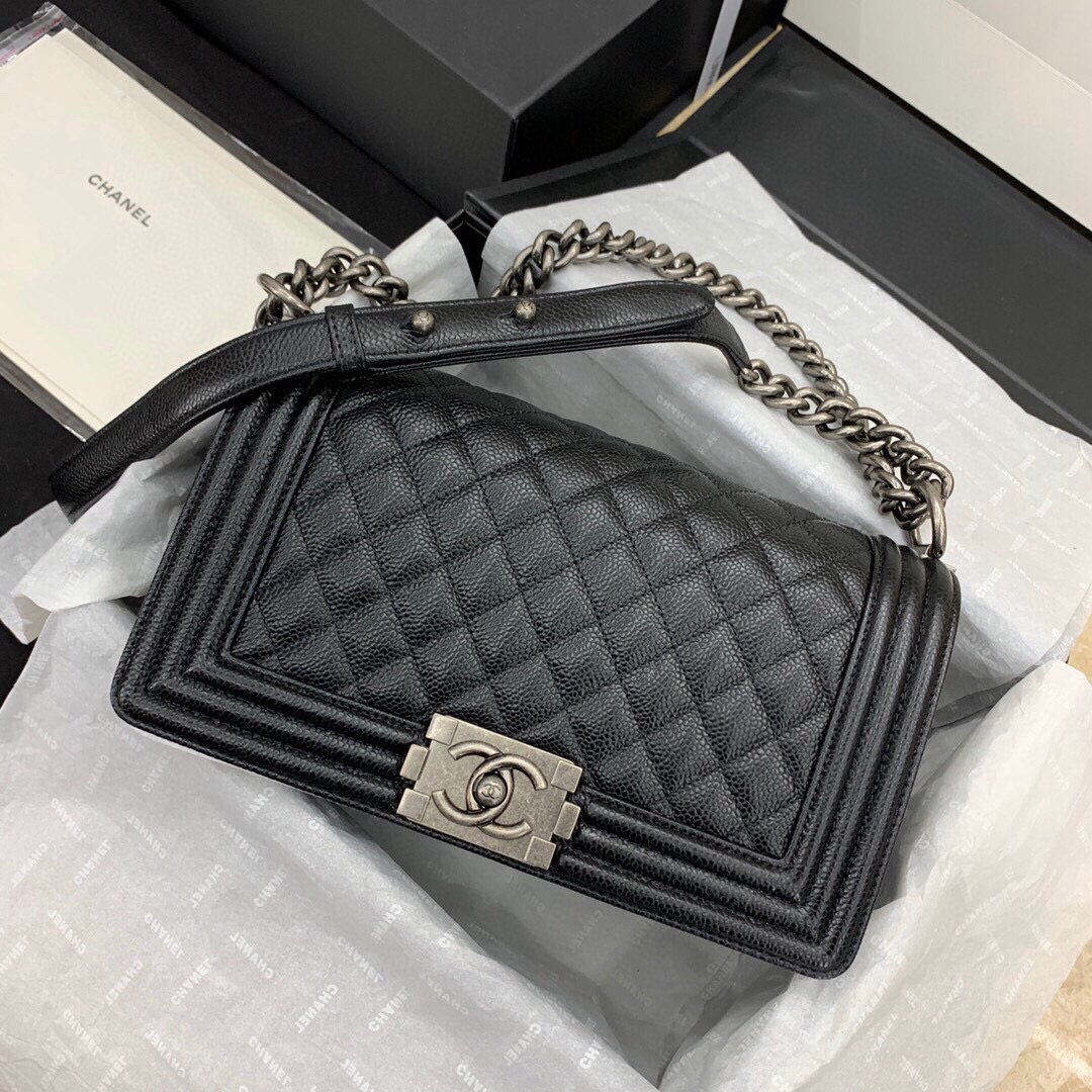 Boy Chanel bag worn by a fashion blogger